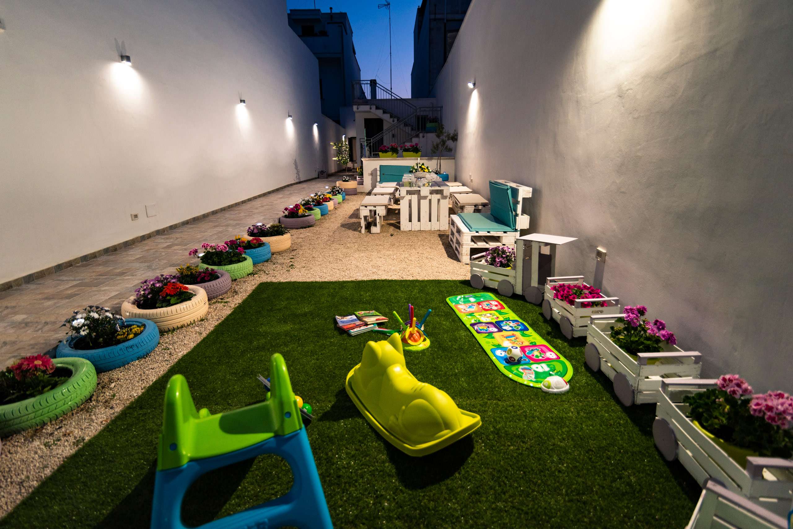 Private garden with toys at the family friendly B&B Casa di Anita | Salento