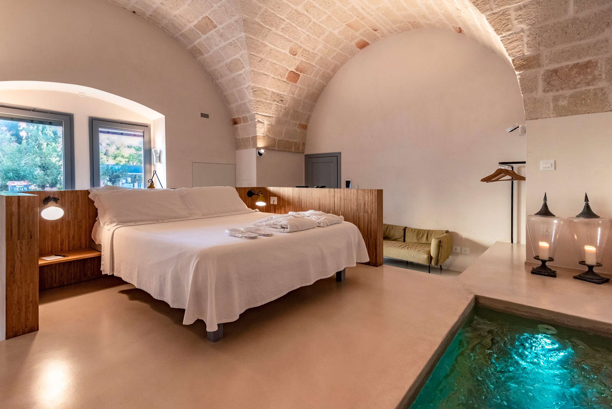 The bedroom with private pool in one of the five luxury flats at Cinquevite in Polignano a Mare | Puglia