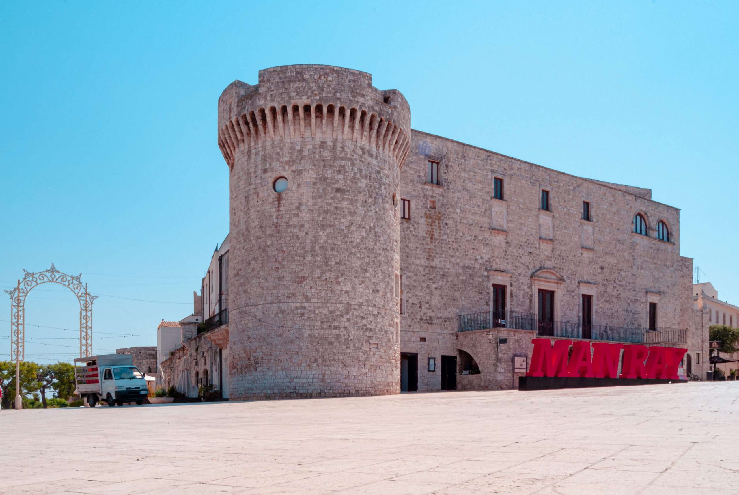 Castles in Puglia - Tower and facade of the Castle of Conversano - Imperial Apulia